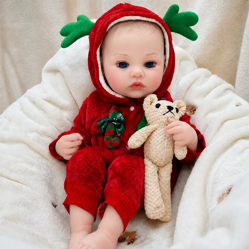 Soft-touch reborn baby doll featuring delicately painted facial details, fine hair texture, and realistic hands and feet.
