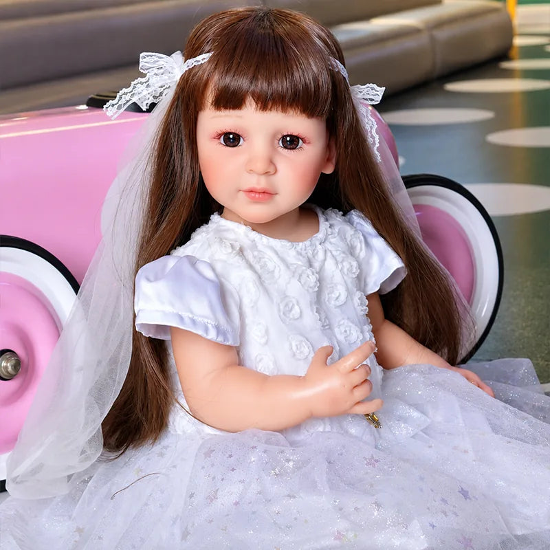 Artfully crafted reborn doll with realistic vinyl skin, layered hand-painted details, and carefully styled rooted-look hair.