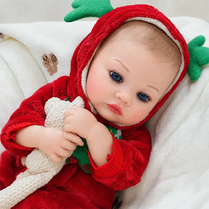 Close view of a realistic reborn doll’s blue eyes, delicate eyelashes, softly painted eyebrows, and natural pink lips.