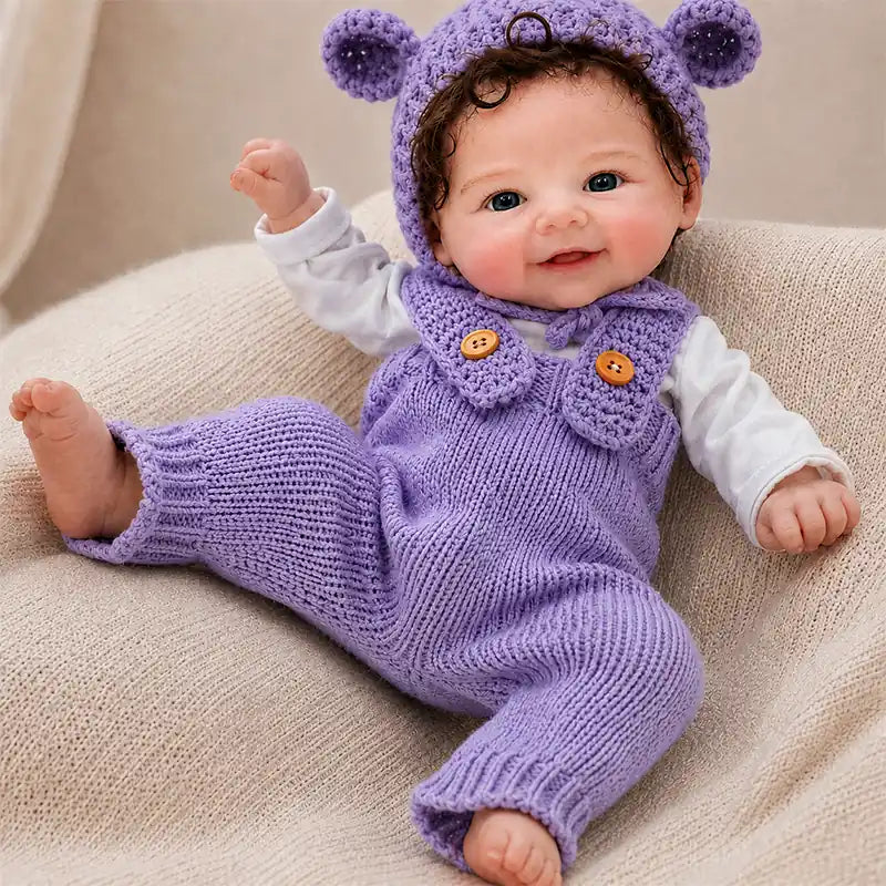 Full Silicone Reborn Baby Doll – Cozy Nursery Companion Dressed in a Purple Knitted Bear Outfit