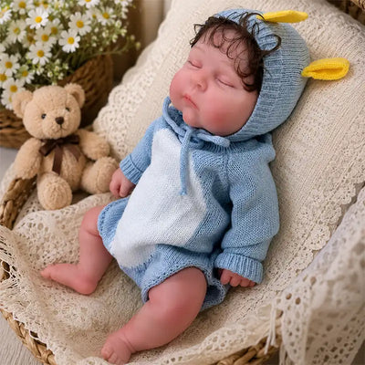 Full Silicone Reborn Baby Doll in a blue knitted animal romper