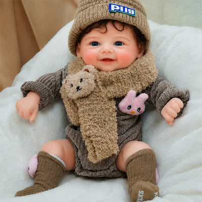 Full Silicone Reborn Baby Doll Resting on a Cozy White Cushion in a Warm Nursery Setting