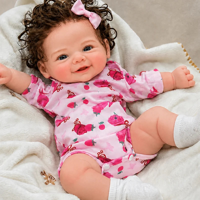 Full Silicone Reborn Baby Doll with Curly Brown Hair, Pink Bow, Rosy Cheeks, and Detailed Hands