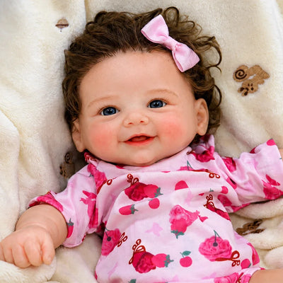 Full Silicone Reborn Baby Doll with Lifelike Skin, Bright Blue Eyes, and a Cheerful Smile
