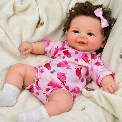 Full Silicone Reborn Baby Doll Resting on a Soft Cream Blanket for Nursery Play and Display