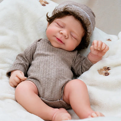 Full Silicone Reborn Baby Doll resting on a soft nursery blanket for cuddling, role-play, photography, and gift-giving