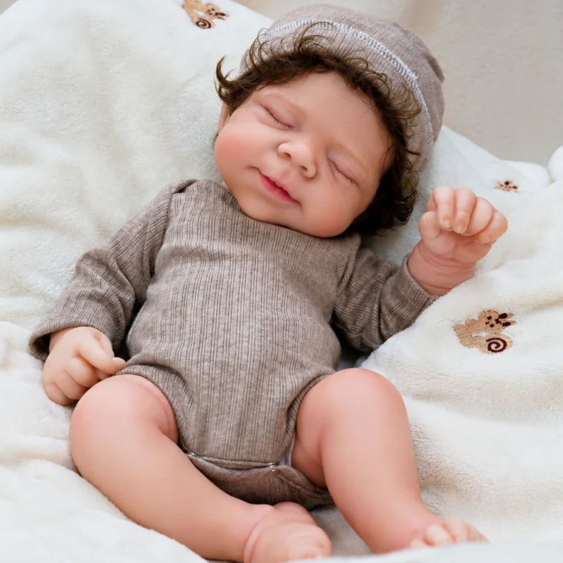 Full Silicone Reborn Baby Doll resting on a soft nursery blanket for cuddling, role-play, photography, and gift-giving