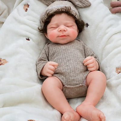 Full Silicone Reborn Baby Doll featuring curly rooted hair, rosy cheeks, tiny hands, wrinkled feet, and delicate toes