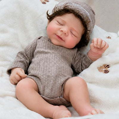 Full Silicone Reborn Baby Doll handcrafted from soft silicone with detailed skin painting and individually rooted curly hair