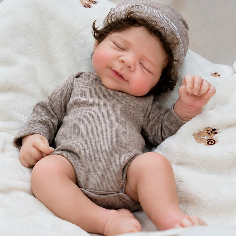 Full Silicone Reborn Baby Doll handcrafted from soft silicone with detailed skin painting and individually rooted curly hair