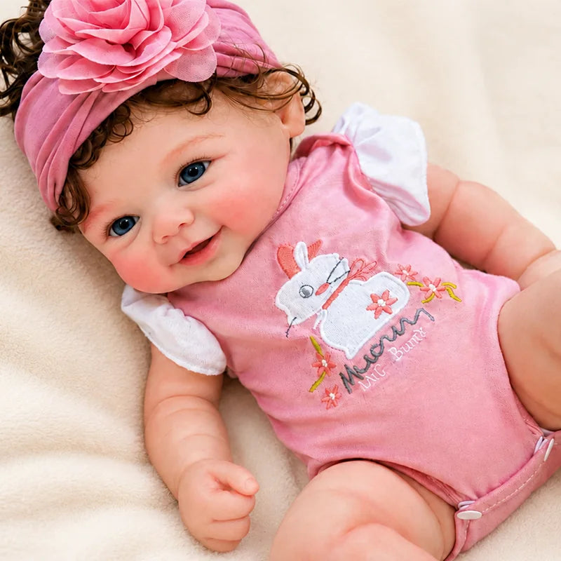 2.Full Silicone Reborn Baby Doll relaxing on a soft nursery blanket, perfect for pretend play, photography, or display. 
