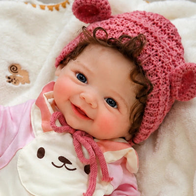 Full Silicone Reborn Baby Doll with Lifelike Skin, Bright Blue Eyes, and a Sweet Smiling Expression