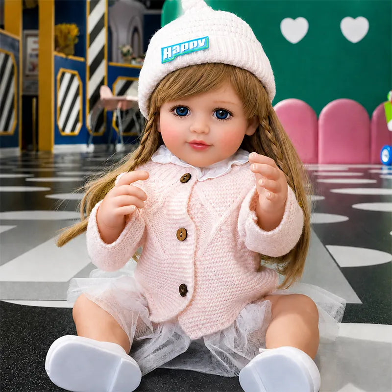 Reborn toddler doll seated inside a cheerful American-style diner, perfect for imaginative outings, doll photography, and storytelling play.