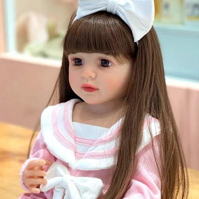 Sweet interactive reborn toddler doll created for storytelling, hair styling, dressing up, cuddling, and everyday companion play.