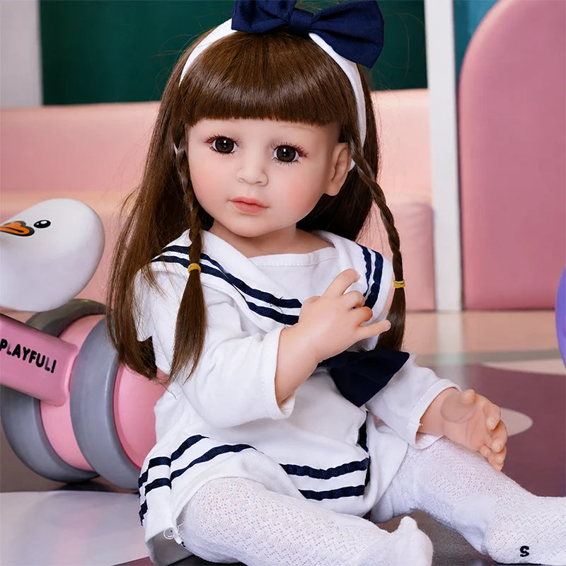 Sophie reborn doll with a soft-touch finish, hand-painted facial details, and carefully rooted-looking brown hair.