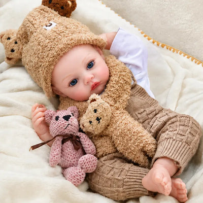 Vinyl reborn baby doll crafted with multi-layer hand-painted skin tones and finely detailed facial features.